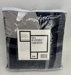 Twin Xl Reversible Comforter Ocm 66X90 Inches. Fixed Price $40.00.