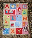 Cocalo Baby Blanket Quilt Comforter Primary Colors Reversible Patchwork Zoo. Fixed Price $25.99.