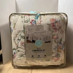New Martha Stewart Queen Size Reversible White Floral Print Comforter & 2 Shams. Fixed Price $65.00.