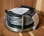 Mainstays Coaster Set Stainless Steel With Holder 6 Pieces Padded Back. Fixed Price $5.00.