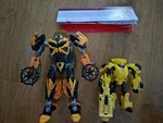 Transformers Age Of Extinction Duo Evolution Bumblebee Figures. Fixed Price $30.00.