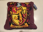 New With Tags Warner Bros Harry Potter Throw Pillow Red Gryffindor 11"X11". Fixed Price $9.99.